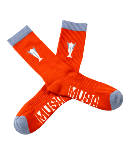 Red Musa socks with bottle detail, a fun and economical gift for Christmas